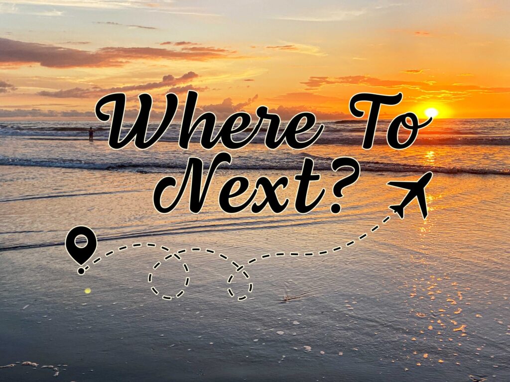 Sunset beach background with text overlay: Where To Next?