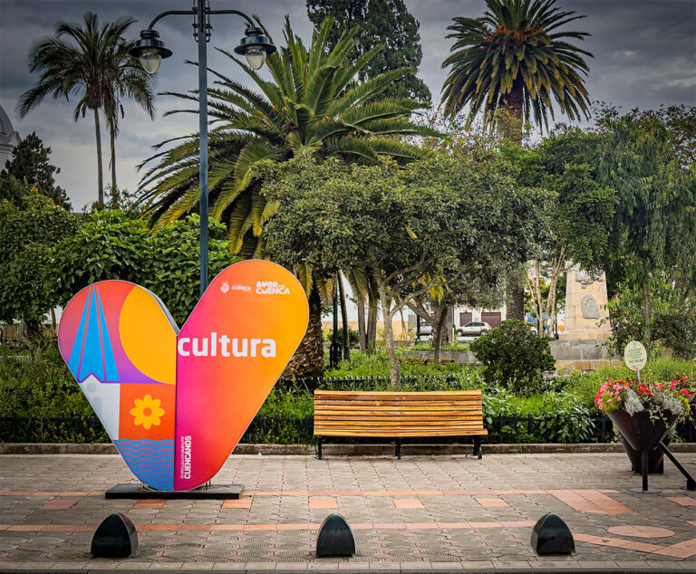 A heart-shaped sculpture with the phrases "culture" and "love of Cuenca" at Plaza de San Sebastián, Cuenca, Ecuador